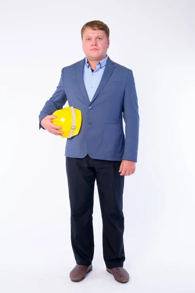 Full body shot van overgewicht zakenman als ingenieur — Stockfoto