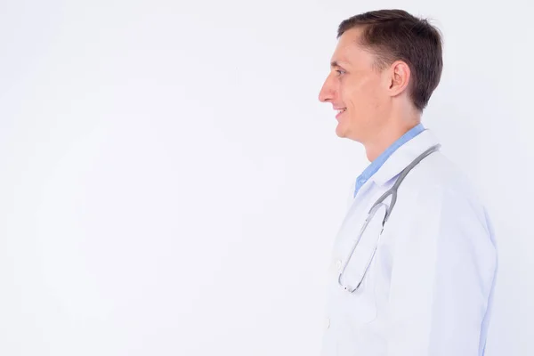 Visão de perfil de close-up de homem feliz médico sorrindo — Fotografia de Stock