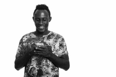 Black and white studio portrait of young African man