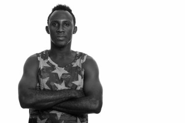 Black and white studio portrait of young African man