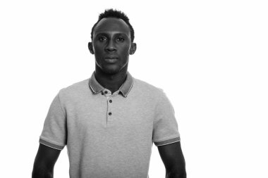 Black and white studio portrait of young African man