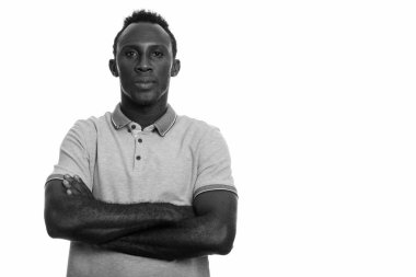 Black and white studio portrait of young African man