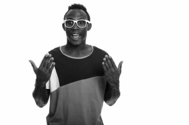 Black and white studio portrait of young African man
