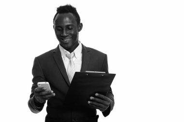 Black and white studio portrait of young African man