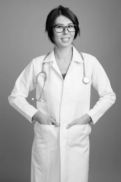 Portrait of young woman doctor shot in black and white — Stock Photo, Image