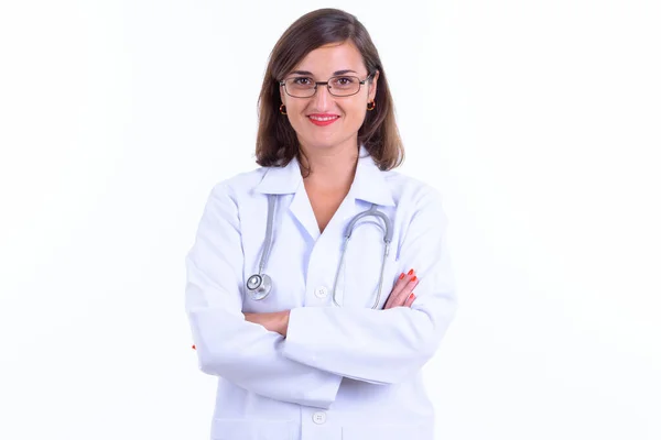 Happy beautiful woman doctor with eyeglasses smiling with arms crossed — 스톡 사진