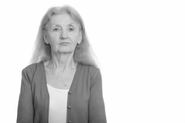 Studio shot of senior woman in black and white — Stock Photo, Image