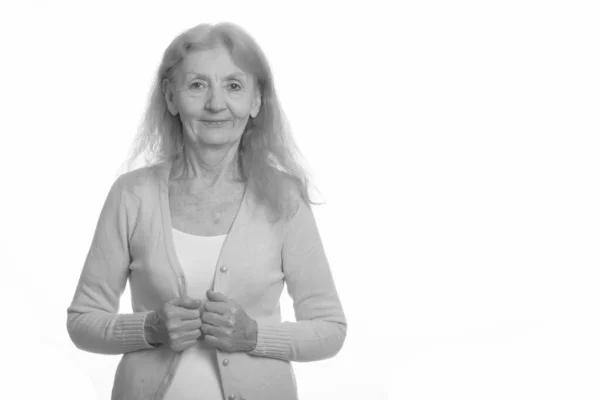 Studio shot of senior woman in black and white — Stock Photo, Image