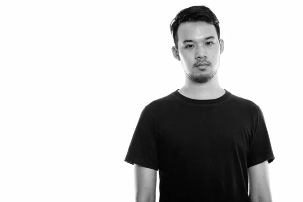 Estudio de tiro de joven asiático hombre en blanco y negro —  Fotos de Stock