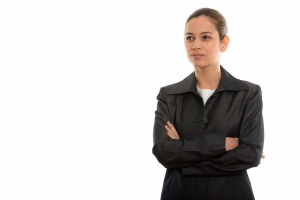 Studioaufnahme einer jungen schönen Geschäftsfrau, die mit Waffen denkt — Stockfoto