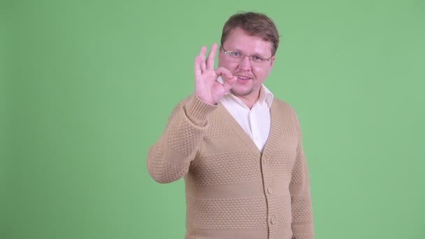 Happy overweight bearded man with ok sign — Stock Video