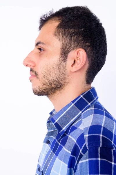 Vista del perfil de primer plano del joven hipster persa barbudo — Foto de Stock