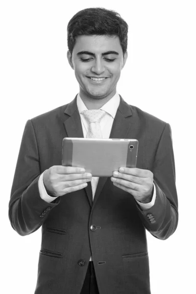 Jong gelukkig Perzisch zakenman met digitale tablet — Stockfoto