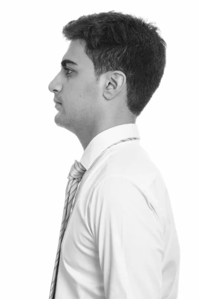 Profile view of fiatal jóképű perzsa üzletember — Stock Fotó