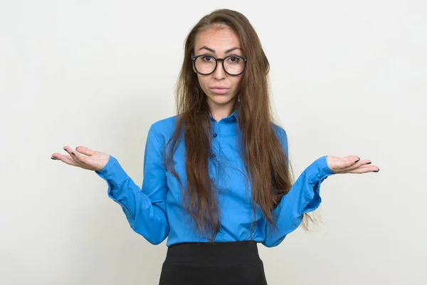 Portrait of young businesswoman with eyeglasses shrugging shoulders — Stock Photo, Image