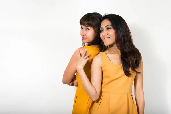 Studio Shot Two Young Asian Women Together White Background —  Fotos de Stock