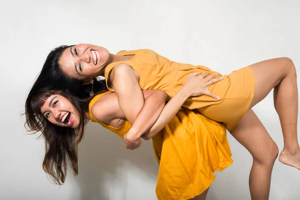 Studio Shot Two Young Asian Women Together White Background — Stockfoto