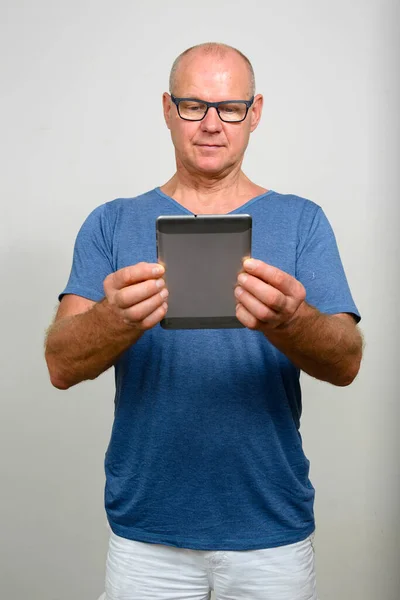 Portrait of mature handsome man with eyeglasses Stock Image