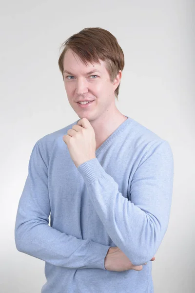 Portrait of happy young handsome man thinking — Stock Photo, Image