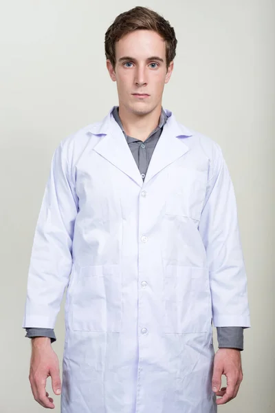 Studio Shot Young Handsome Man Doctor White Background — Stock Photo, Image