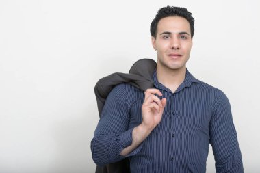 Studio shot of young muscular handsome man 