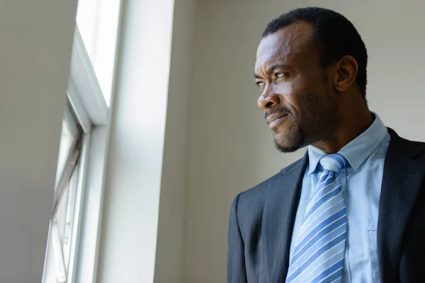 Portrait Handsome Bearded African Businessman Window Room —  Fotos de Stock