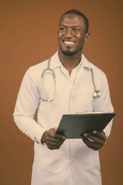 Studio Shot Handsome African Man Doctor Brown Background — Stock Photo, Image