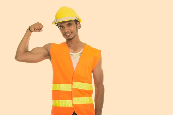 Studio Shot Young Handsome Bearded Indian Man Construction Worker Isolated — Stock Photo, Image