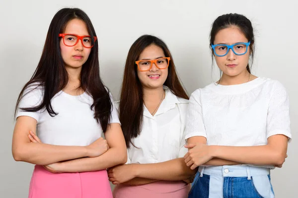 Studio Shot Three Young Beautiful Asian Women Friends Together White — Foto Stock