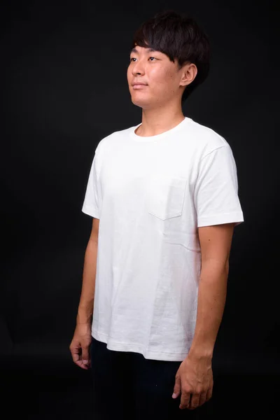 Estudio Disparo Joven Guapo Asiático Hombre Sobre Fondo Negro —  Fotos de Stock