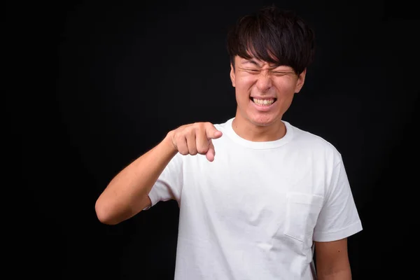 Estudio Disparo Joven Guapo Asiático Hombre Sobre Fondo Negro —  Fotos de Stock