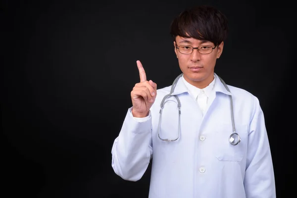 Studio Shot Young Handsome Asian Man Doctor Black Background — Foto Stock