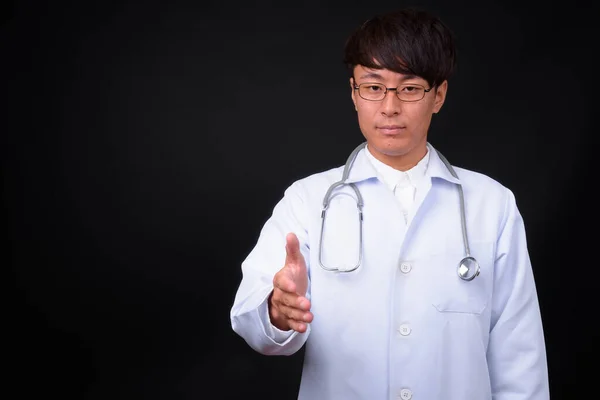 Studio Shot Young Handsome Asian Man Doctor Black Background — Zdjęcie stockowe