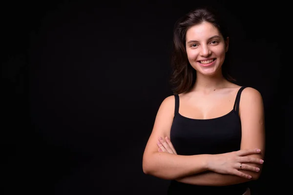 Studio Shot Van Jonge Mooie Vrouw Tegen Zwarte Achtergrond — Stockfoto