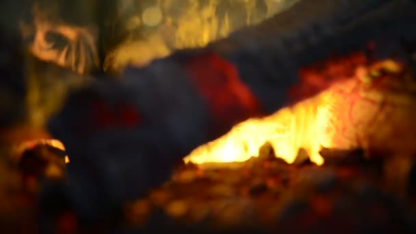 Hot smoldering charcoals burning in flames — Stock Video