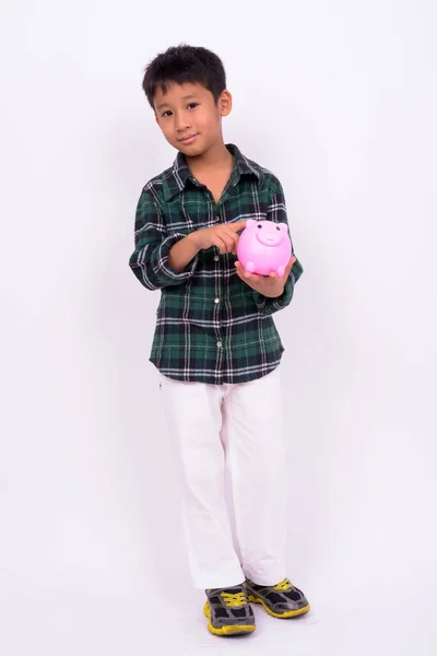 Studio Záběr Roztomilý Asijské Chlapec Sobě Zelené Kostkované Tričko Proti — Stock fotografie