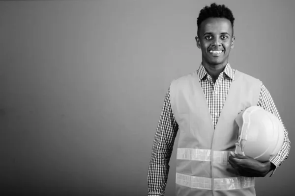 Studio Shot Young Handsome African Man Construction Worker Gray Background — Stockfoto