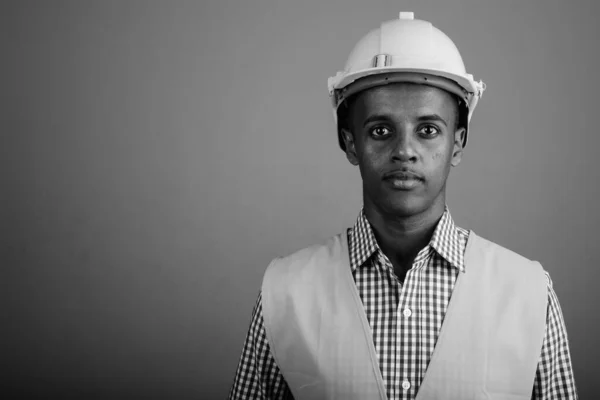 Studio Shot Young Handsome African Man Construction Worker Gray Background — Stockfoto