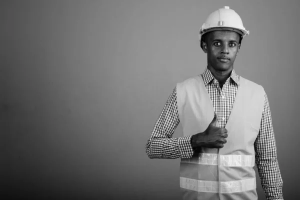 Studio Shot Young Handsome African Man Construction Worker Gray Background — Stockfoto