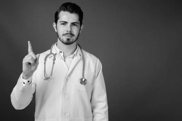 Studio Shot Young Handsome Bearded Man Doctor Gray Background Black — Stock Photo, Image