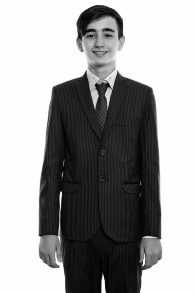 スタジオショットの若いですハンサムなペルシャの十代の男の子としてビジネスマンとして黒と白のスーツを着て — ストック写真