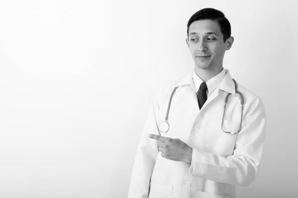 Estúdio Tiro Jovem Bonito Médico Homem Contra Fundo Branco Preto — Fotografia de Stock