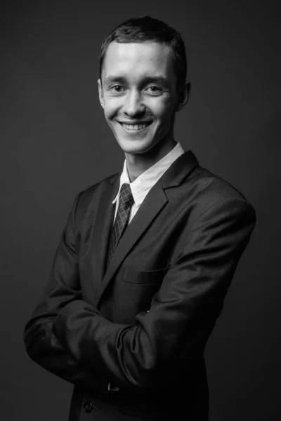 Studio Shot Young Businessman Wearing Suit Gray Background Black White — Stock Photo, Image