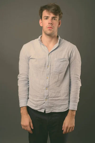 Studio Shot Young Handsome Man Wearing Blue Shirt Gray Background — Stock Photo, Image