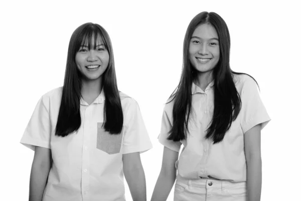 Στιγμιότυπο Από Δύο Νεαρές Όμορφες Ασιάτισσες Έφηβες Μαζί Απομονωμένες Λευκό — Φωτογραφία Αρχείου