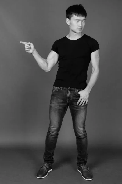 Studio Shot Young Chinese Man Wearing Black Shirt Gray Background — Stock Photo, Image