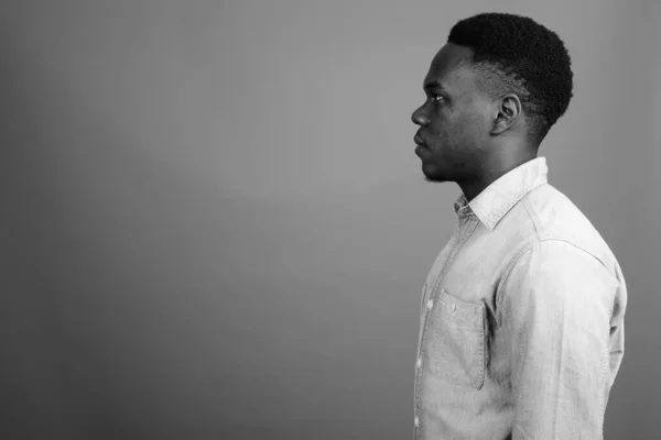 Studio Shot Young African Man Wearing Denim Shirt Gray Background — Stock Photo, Image