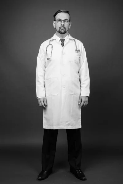 Studio Shot Blond Bearded Man Doctor Goatee Gray Background Black — Stock Photo, Image