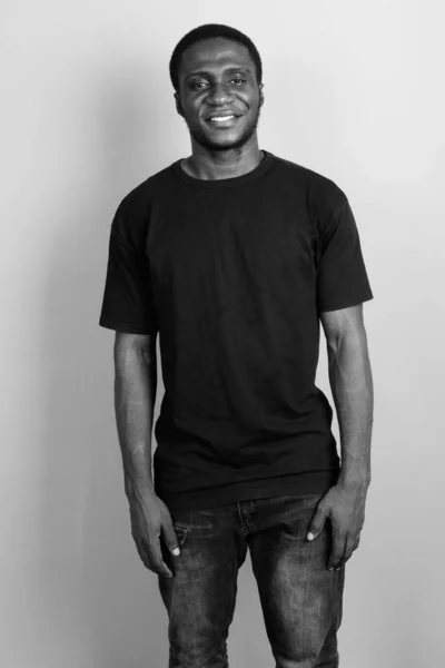 Studio Shot Young African Man Wearing Black Shirt Gray Background — Stock Photo, Image