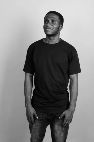 Studio Shot Young African Man Wearing Black Shirt Gray Background — Stock Photo, Image